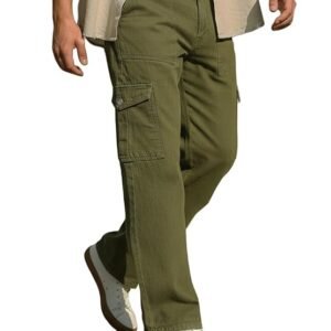 A person modeling olive green cargo pants with side utility pockets and white sneakers.