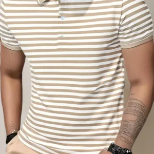 Close-up of a man wearing a beige and white horizontal striped polo shirt with a solid beige collar and white button placket, styled with tan trousers and a watch.